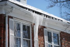 Ottawa house with icicles and damaged soffit caused by poor attic insulation.